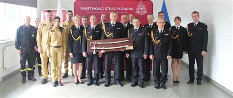 Infografika przedstawiająca ścieżkę awansu zawodowego mł. bryg. Jacka Donaja