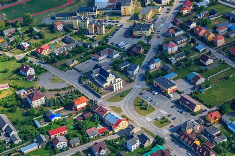 Uroczystości jubileuszowe OSP Rutki-Kossaki - parada i zgromadzenie przed Gminnym Domem Kultury