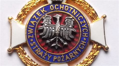 Ilustracja przedstawiająca poszczególne odznaczenia OSP: Złoty Znak Związku, Medal Honorowy im. Bolesława Chomicza, Medal 