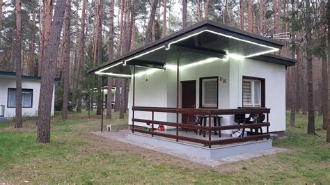 Zdjęcie domków letniskowych nad jeziorem Sosno, pomosty, jezioro