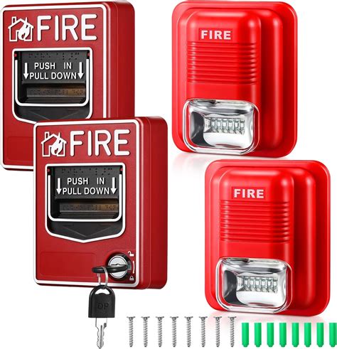 Thematic photo of a fire station with an activated siren