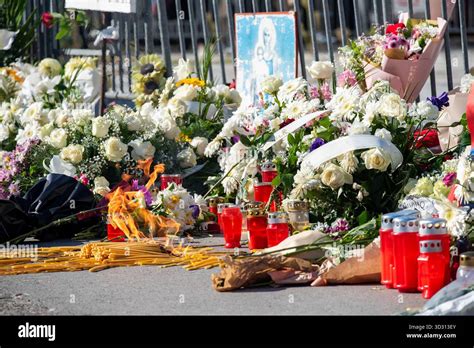 Photo of flowers and candles at the site of the tragedy