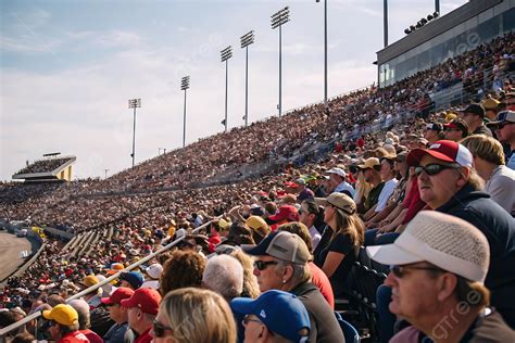 Thematic photo of a large public gathering with rainbow flags and banners.
