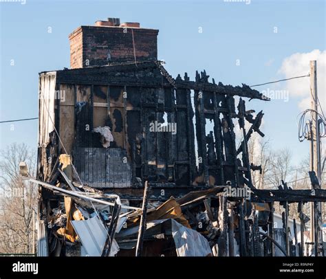 Thematic photo of a burned out barn or agricultural building.