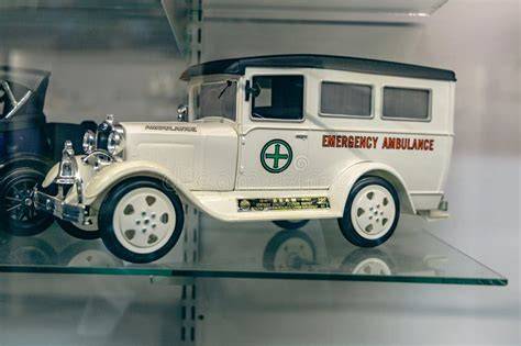 The Gazela ambulance, a historical vehicle, displayed in the Krakow Museum of Rescue, possibly with its doors open to show the medical interior