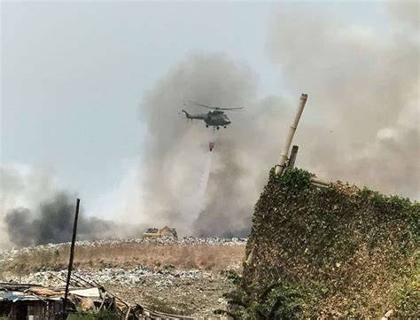 Thematic photo of environmental contamination after a landfill fire