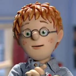 Character portrait of Norman Price from Fireman Sam, possibly with a mischievous smile