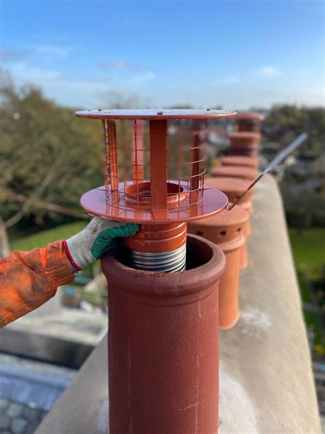 Thematic photo of a chimney with a chimney cowl installed
