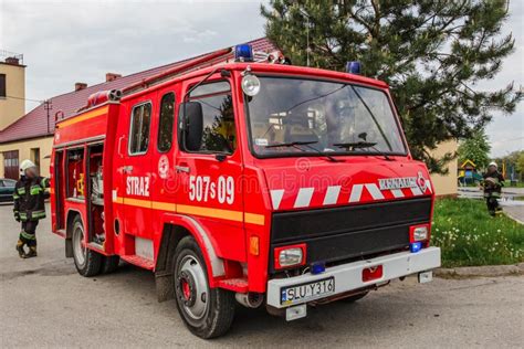 Thematic photo of a red fire truck, possibly from OSP Husów or similar volunteer fire department