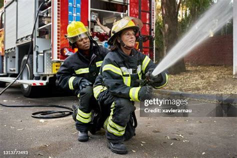 Thematic photo of a firefighter in action, showing specialized boots