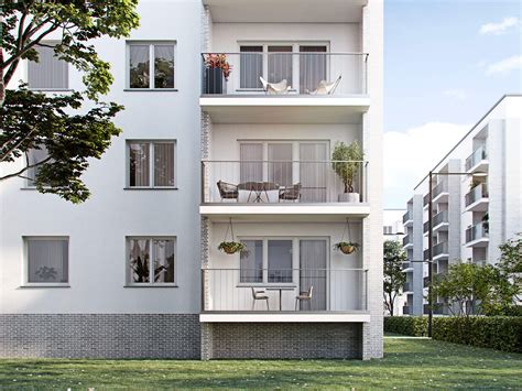 blok mieszkalny po termomodernizacji z widocznymi pominiętymi fragmentami