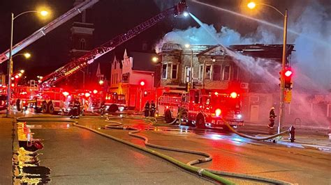 Thematic photo of fire department at a building fire at night
