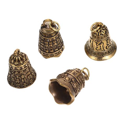 Mosiężny dzwonek z barokowymi zdobieniami