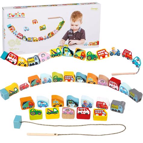 Zdjęcie drewnianego autka straży pożarnej na sznurku marki Goki