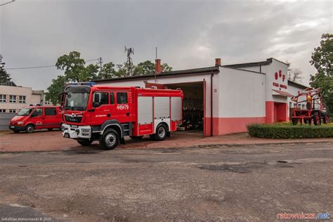 The newest Kamaz fire truck for OSP Sobótka, featuring its 4x4 chassis, integrated crew cabin, specialized compartments, and a roof working platform. Dynamic photo with fire-fighting equipment visible.