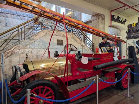 Photo of a modern fire truck and an older, historic fire truck (if possible, specifically the Renault and the one from Jurowce in the museum)