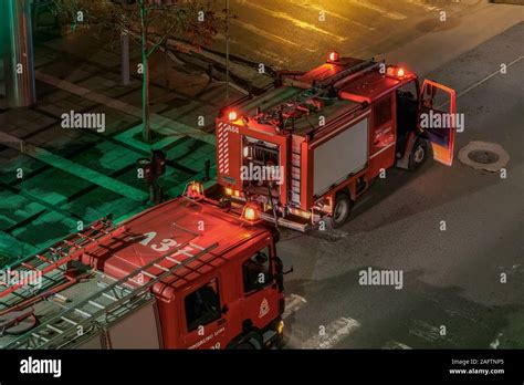 Thematic photo of fire brigade vehicles at night