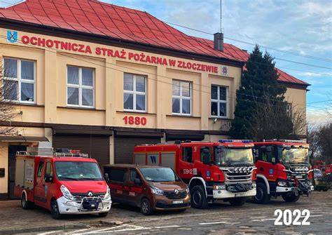 The building of a typical Polish Ochotnicza Straż Pożarna (OSP) station with a fire truck