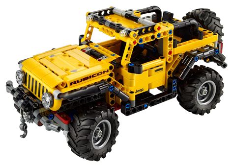 The LEGO Technic Jeep Wrangler (42122) model on an off-road obstacle course