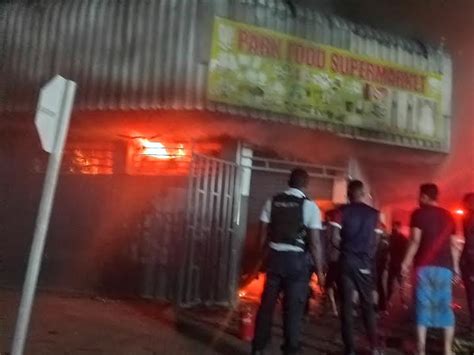 Thematic photo of a burning supermarket or warehouse