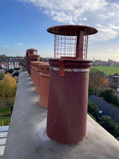 Diagram comparing efficiency of different chimney cowls or chimney top accessories