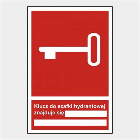Zdjęcie szafki hydrantowej wewnętrznej w neutralnym kolorze z prawidłowym oznakowaniem