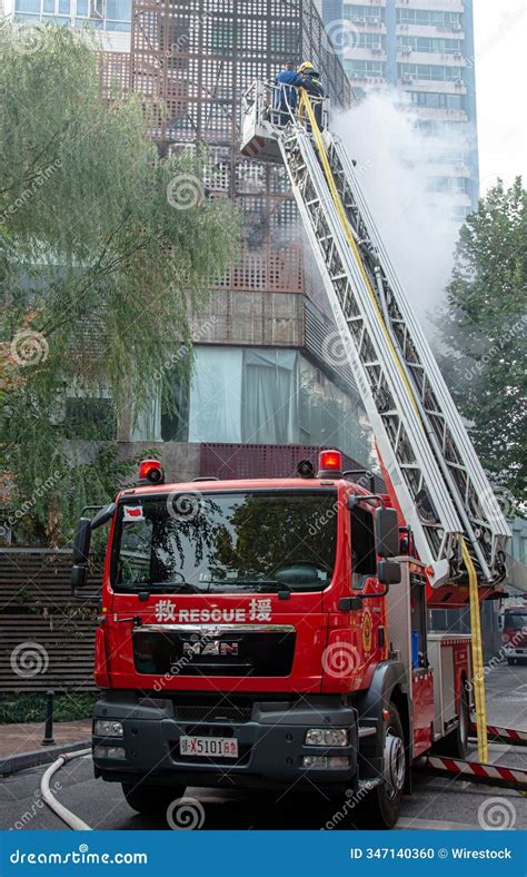 Thematic photo of a modern fire truck in action during a city fire simulation