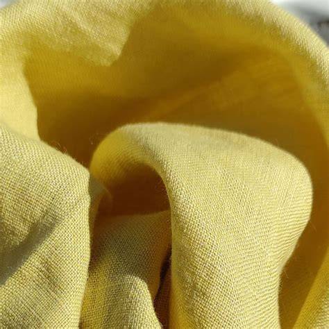 Próbki tkanin trudnopalnych: wełna, poliester, aramid