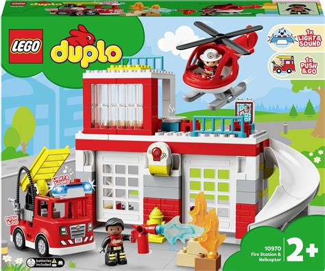Thematic photo of children playing with LEGO Duplo 10970 Fire Station and Helicopter