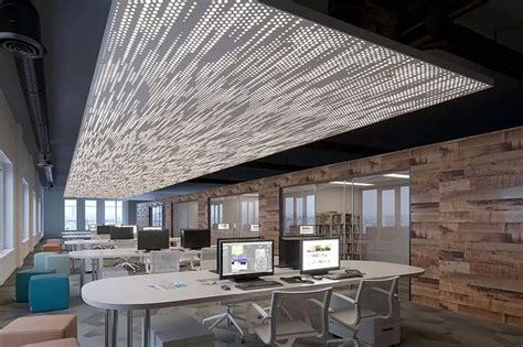 Thematic photo of a modern office ceiling with integrated speakers and fire alarms
