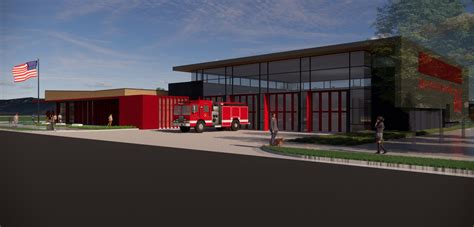 Thematic photo of a modern fire station with a fire truck in front, emphasizing readiness