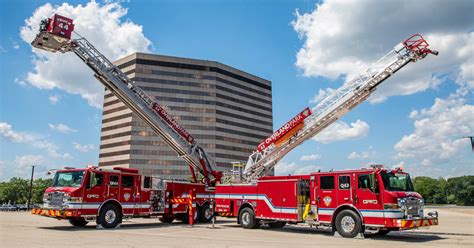Thematic photo of a broken fire ladder on a fire truck during tests, with firefighters observing
