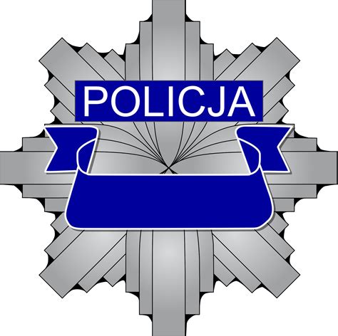 Zdjęcie policyjnej odznaki na tle dokumentów prokuratorskich, symbolizujące śledztwo w sprawie policjanta.