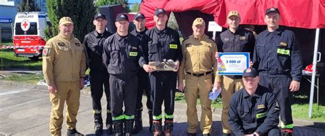 Historyczne zdjęcie kutnowskich strażaków lub archiwalne dokumenty Komendy PSP w Kutnie