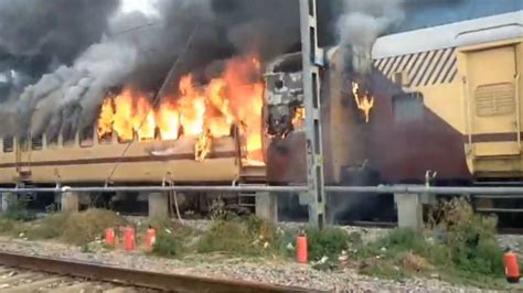 Thematic photo of a train on fire at a station
