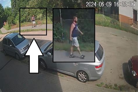 zdjęcie z nagrania monitoringu pokazujące mężczyznę z miotaczem ognia