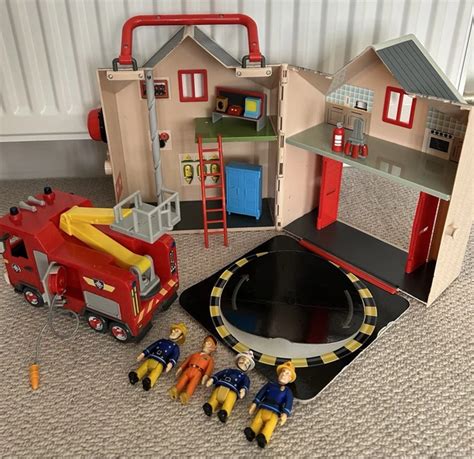 Photo of Fireman Sam themed toys including a fire engine and figures