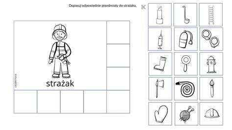 Dziecko wycinające elementy z karty pracy o strażakach