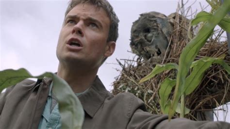 Scarecrow prezentujący swoją toksynę strachu Batmanowi