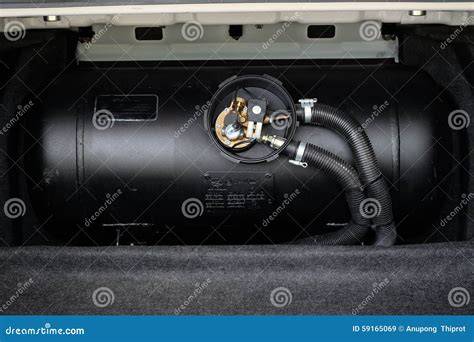 Thematic photo of a car with an LPG tank, possibly with flames or smoke