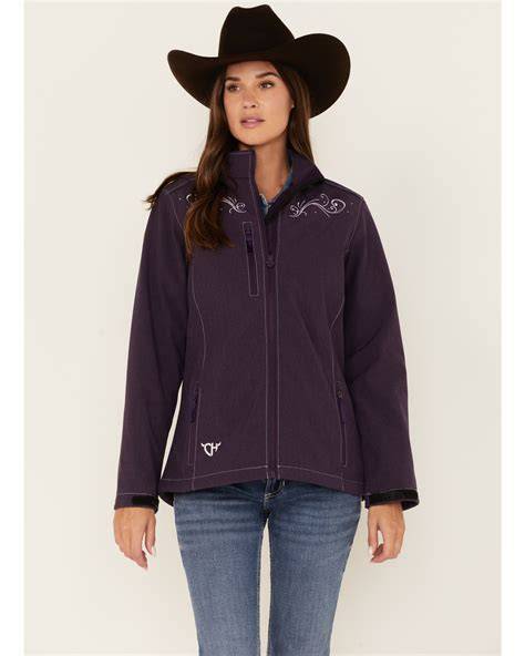 Thematic photo of a firefighter wearing a softshell jacket with an embroidered emblem