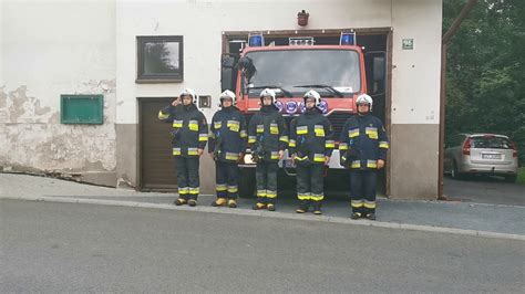 Historical photo of OSP Pewel Ślemieńska firefighters or their early equipment.