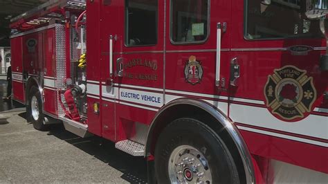 Thematic photo of a fire truck and firefighters
