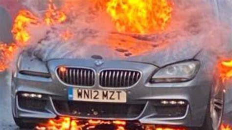 Thematic photo of a BMW car on fire