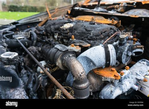 Photo of a damaged car engine compartment