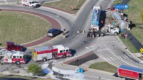 Photo of an overturned fire truck on a roundabout