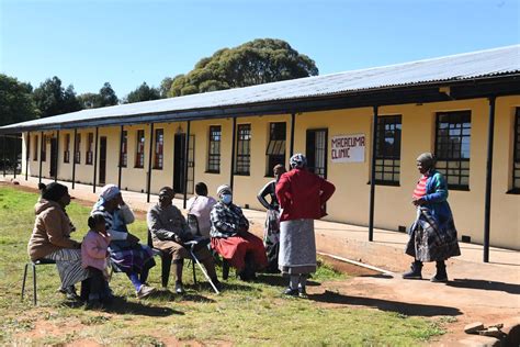 Thematic photo of a fire station in a rural setting, possibly with local community members