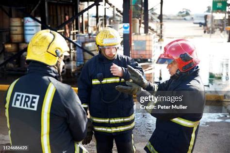 Thematic photo of firefighters during a meeting