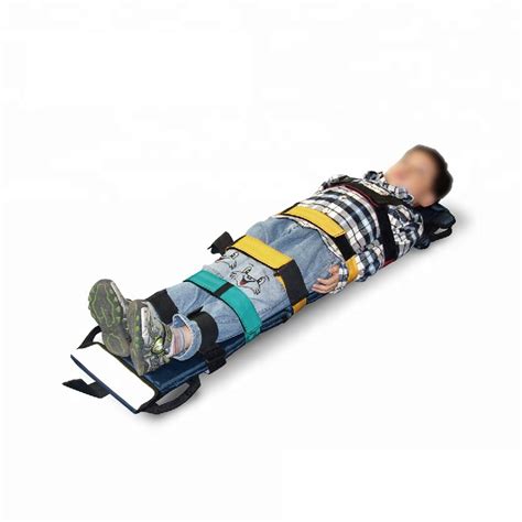 Thematic photo of a pediatric spine board with safety belts