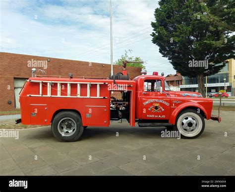 Historical photo of a Polish fire truck from the 1950s or 60s with black fenders and bumpers